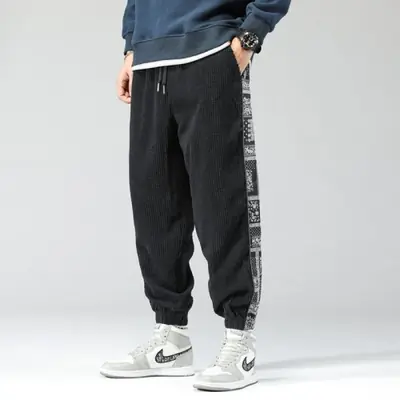 Image de Pantalon homme velours côtelé imprimé fleur de cajou style Y2K