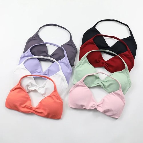 Image of Ultra-Comfortable Strappy High-Support Sports Bra for Women – Seamless Halter Design with Push-Up Effect, Perfect for Yoga, Gym, and Workout Sessions