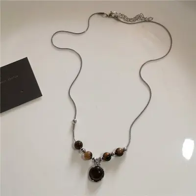 Image de Collier Vintage Soleil en Cuir - Style Y2K Grunge