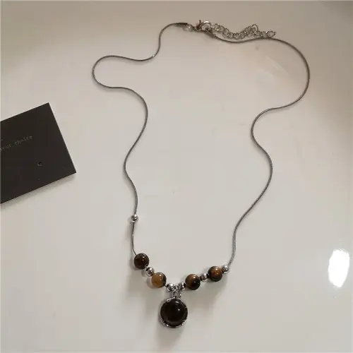 Image de Collier Vintage Soleil en Cuir - Style Y2K Grunge