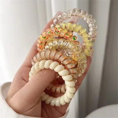 Image de Cravates en Spirale Colorées - Accessoires Cheveux Mignons pour Femmes & Filles