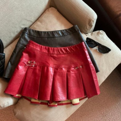 Image of Stylish Women's High-Waisted Pleated Mini Skirt in Genuine Pu Leather – Red and Black Options for a Slim, Modern Look