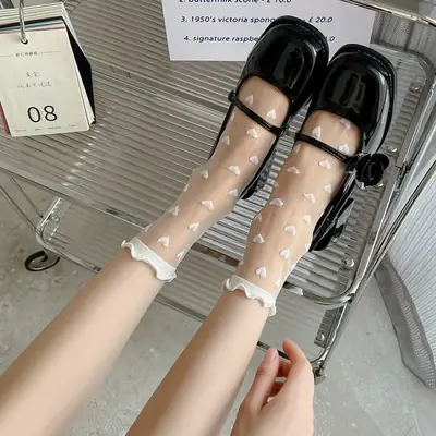 Image de Bas Ultra Minces Transparentes Femme - Élégance & Confort