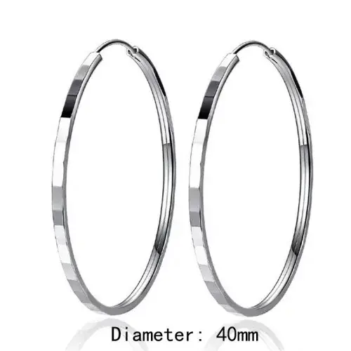 Image de Boucles d'oreilles dorées 18K - Élégance & Style
