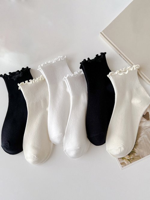 Image of 5 Pairs of Women's Ruffle Cuff Ankle Socks in Black and White – Soft, Breathable, Solid Color Tube Socks for Spring and Autumn
