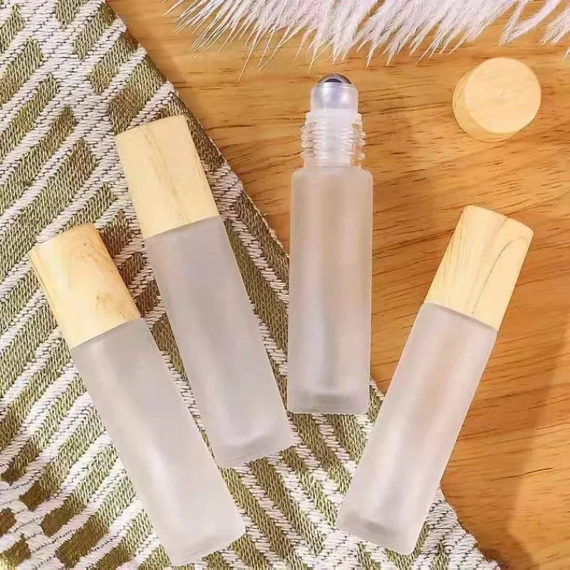Bild von Nachfüllbare Rollerflasche 10ml – Milchglas mit Holzmaserung