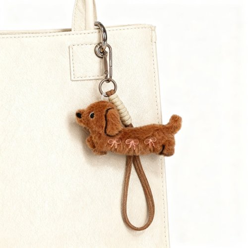 Bild von Niedlicher Rucksack-Anhänger mit süßem Hundemotiv – Lippenstift-Form, Hunde-Dekoration für Taschen, Rückspiegel-Zubehör und cooles Schulzubehör für Kinder und Jugendliche