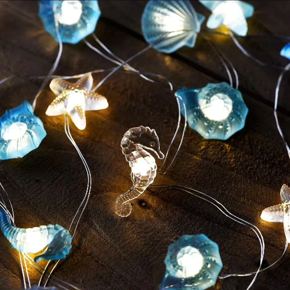 Afbeelding van Oceaan Thema LED Lichtslingers met Schelpen en Zeesterren - 20-30 LED's Onderwater Effect voor Bruiloft, Kerst en Feestdecoratie