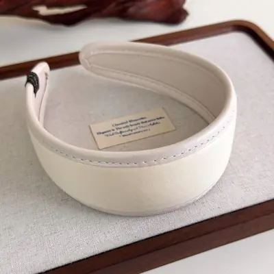 Image de Bandeau en Cuir Rétro Style Français - Accessoire de Cheveux Élégant