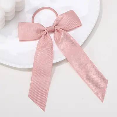 Image de Bandes de Cheveux Douces avec Nœud - Accessoire de Fête pour Filles