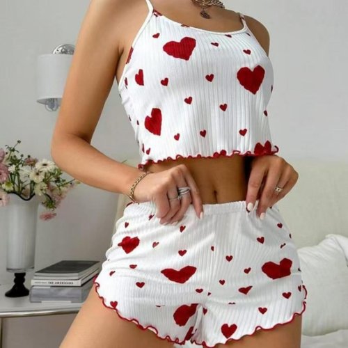 Immagine di Pigiama Donna a Due Pezzi con Stampa a Cuore - Abbigliamento da Casa Morbido e Stile Casual per una Notte di Amore
