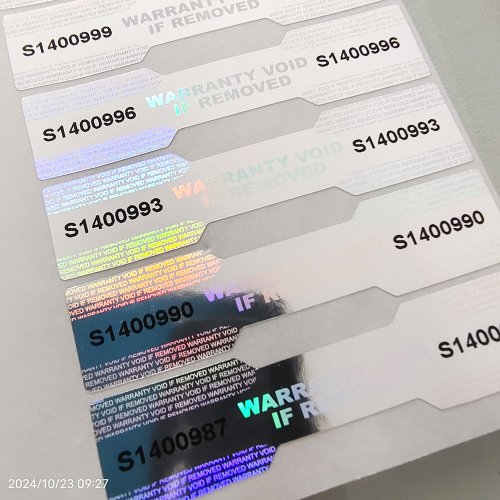Image of 100-Piece Silver Holographic Security Seals with Unique Serial Numbers – Tamper-Evident Dogbone Labels for Package Protection and Authenticity Verification