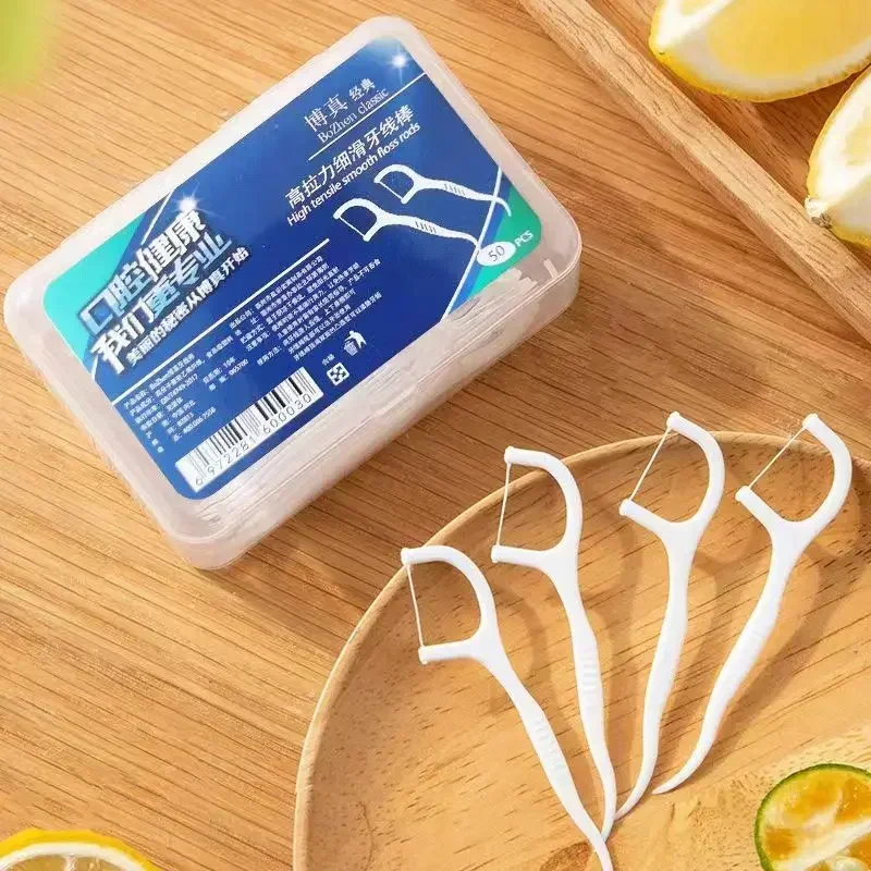 Afbeelding van Natuurlijke Draagbare Wegwerp Tandzijden – 50 Stuks in Doos voor Optimale Mondhygiëne