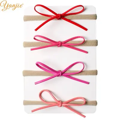 Image de Bandeau Daim Arc Enfant - Accessoire Cheveux Élégant