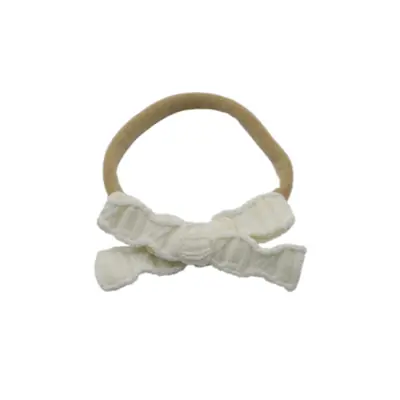 Image de Bandeau Tricoté Élégant pour Bébé - Accessoire Hiver