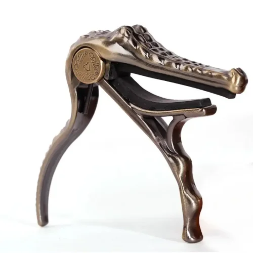 Immagine di Alice A007G Morsetto per capotasto per chitarra acustica folk con design in coccodrillo in metallo all'ingrosso
