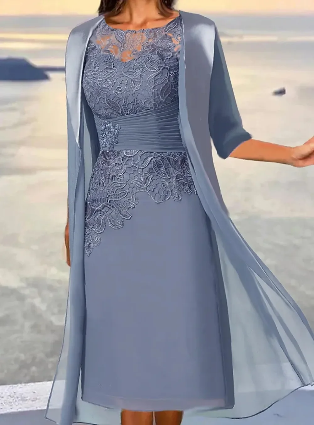 Image of Elegant Dusty Blue Midi Mother of the Bride Dress with Floral Embroidery, Long Sleeves, Layered Ruched Design, Crew Neck – Perfect for Fall Weddings
