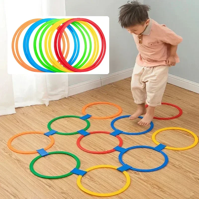 Immagine di Set Gioco All'Aperto per Bambini con 10 Cerchi e 10 Connettori – Reticolo di Salto per Allenamento Fisico e Divertimento Sportivo per Ragazzi e Ragazze