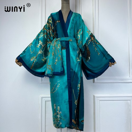 Immagine di WINYI Kimono Donna Moda estiva Stampa Cardigan a maniche lunghe Donna Abaya allentata Casual Beach Cover Up abito boho con sciarpa