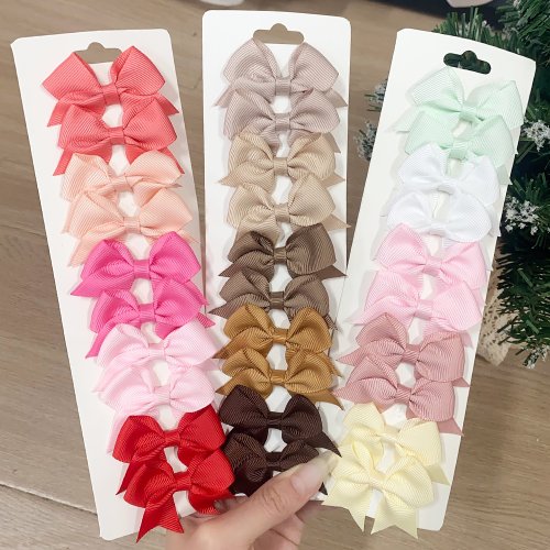 Immagine di Set di 10 graziosi fermagli con fiocco in raso solido per neonate e bambine – Accessori per capelli fatti a mano, eleganti e delicati