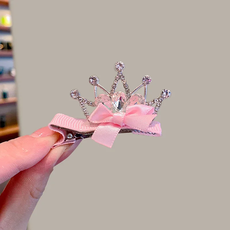 Imagen de Accesorios divertidos para perros y gatos: coronas, lazos y pinzas de pelo