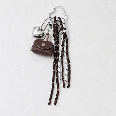 Image de Pendentif en Corde Tressée avec Mini Sac à Nœud - Accessoire de Mode pour Femmes