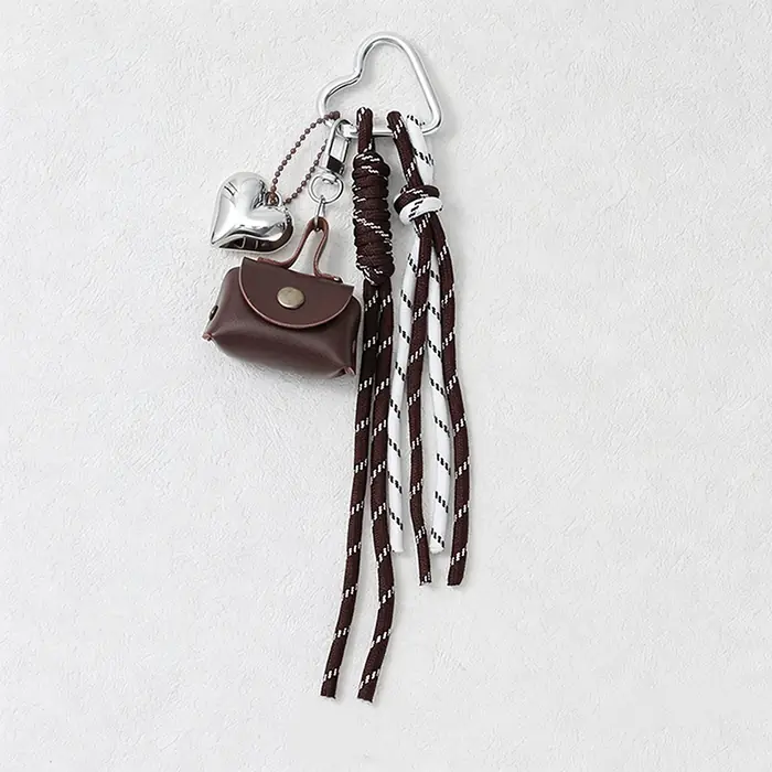 Image de Pendentif en Corde Tressée avec Mini Sac à Nœud - Accessoire de Mode pour Femmes