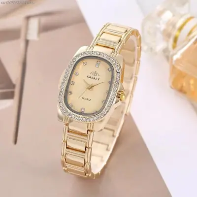Image de Montre Femme Élégante avec Diamants Verts - Design Robe & Acier Inoxydable