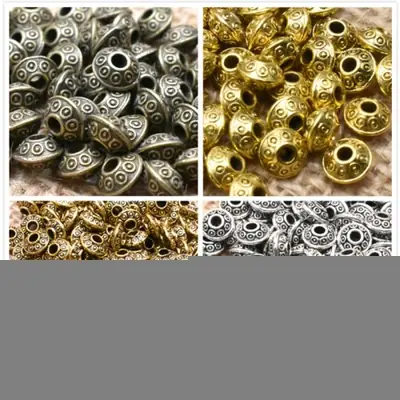 Image de Perles UFO Dorées Tibétaines - 50 pcs