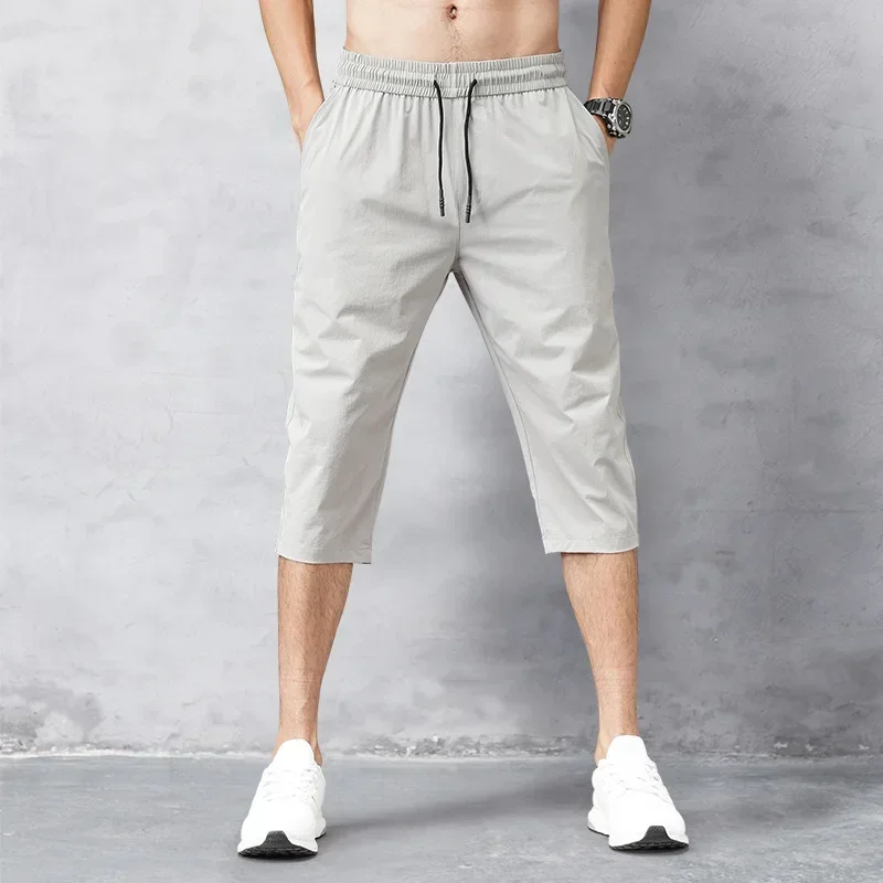Imagen de Pantalones cortos de 3/4 de longitud para hombre, pantalones cortos de verano de seda helada de seca...