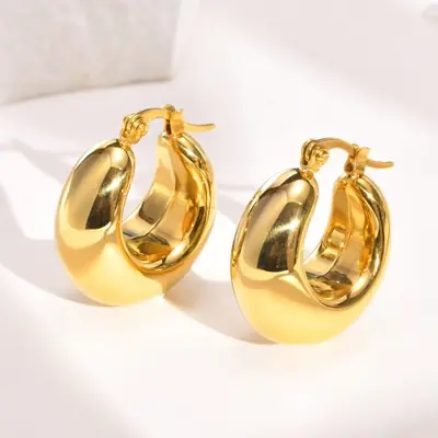 Image de Boucles d'oreilles créoles dorées en acier inoxydable