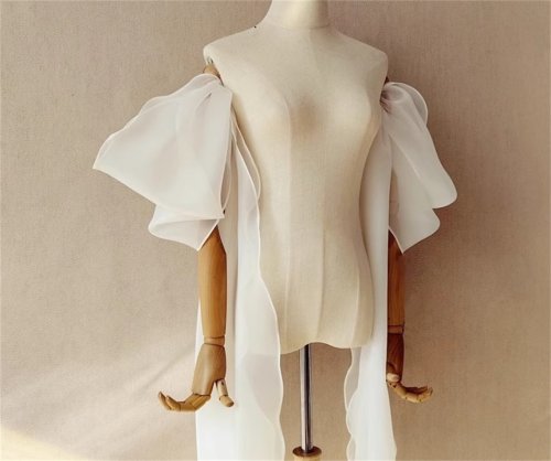 Image of Elegant Organza Bride Sleeve Decorations with Ribbon Accents – Perfect Wedding Accessory for Formal Bridal Wear