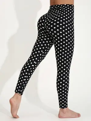 Image de Leggings Noirs à Pois Blancs - Élégants & Extensibles