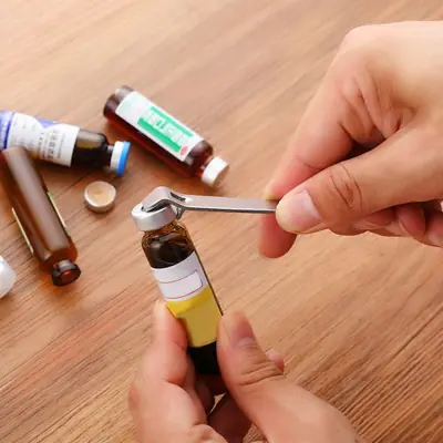 Image de Ouvre-Bouteille Médical en Acier Inoxydable - Pratique & Portable