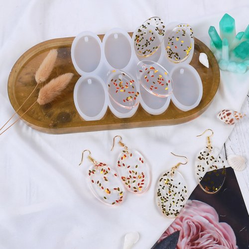 Afbeelding van Natuurlijke siliconen mal voor DIY sieraden: 8-12 stuks ronde en ovale hangers voor epoxy, hars en schimmelprojecten