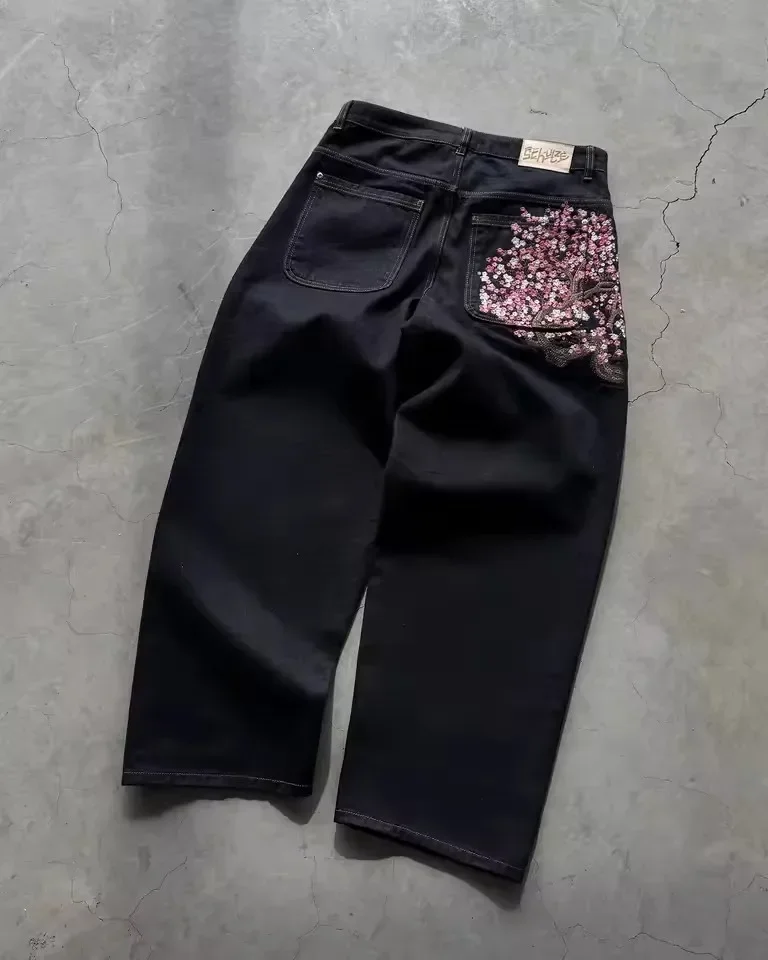 Imagen de Pantalones vaqueros Vintage de cintura baja con bordado de flor de cerezo de Hip Hop, pantalones de pierna ancha, ropa Y2K, pantalones vaqueros holgados bordados para hombres y mujeres