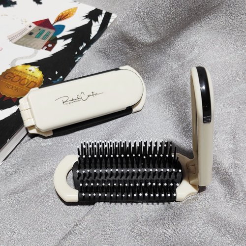 Imagen de Cepillo de Pelo Plegable con Masaje para Cabeza, Portátil y Antiestático, Ideal para Viajes con Espejo Integrado – Peine de Masaje Natural para Niñas y Mujeres