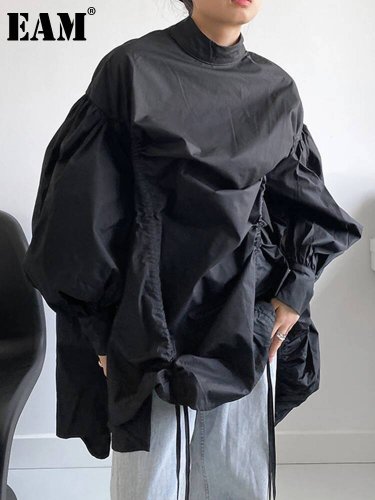 Afbeelding van Stijlvolle Zwarte Blouse met Trekkoord - Grote Maten