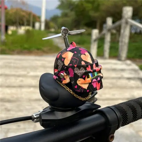 Image de Cloche de Vélo Canard Noir avec Sangles Élastiques - Jouet Amusant pour Enfants