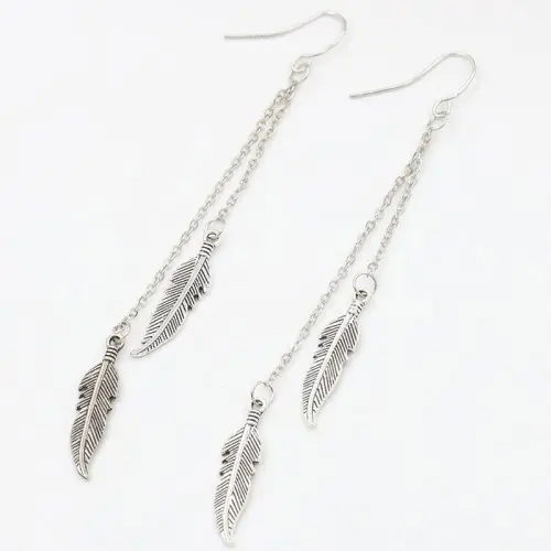 Image de Boucles d'oreilles longues feuille plume élégantes