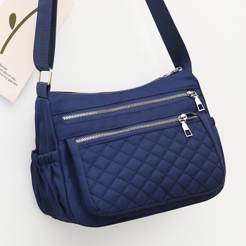 Image of Stylish Waterproof Nylon Shoulder Bag for Women – Multi-Pocket Zipper Messenger Bag with Spacious Design for Travel and Everyday Use