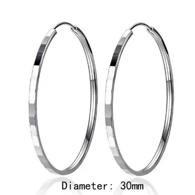 Image de Boucles d'oreilles dorées 18K - Élégance & Style
