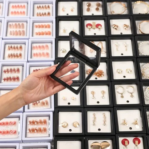 Afbeelding van 10 stks PE Film Zwart Wit Sieraden Opbergdoos 3D Verpakking Case Gratis Stand Drijvend Frame Membraan Ring Oorbel Ketting Display