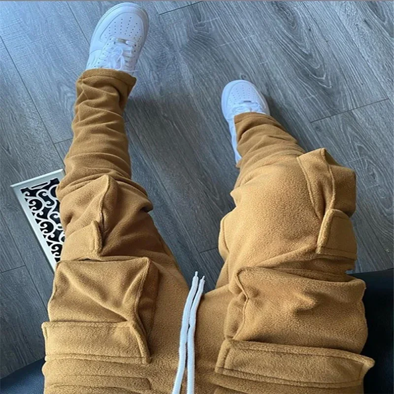 Immagine di Pantaloni Cargo Uomo Primavera-Estate 2024 in Stile Streetwear con Tasche Ampie e Design Casual Sportivo