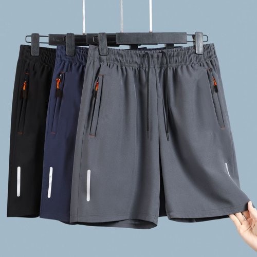 Imagen de Pantalones Cortos Deportivos para Hombre de Verano - Ligeros, Transpirables y con Bolsillo con Cremallera para Entrenamiento y Correr