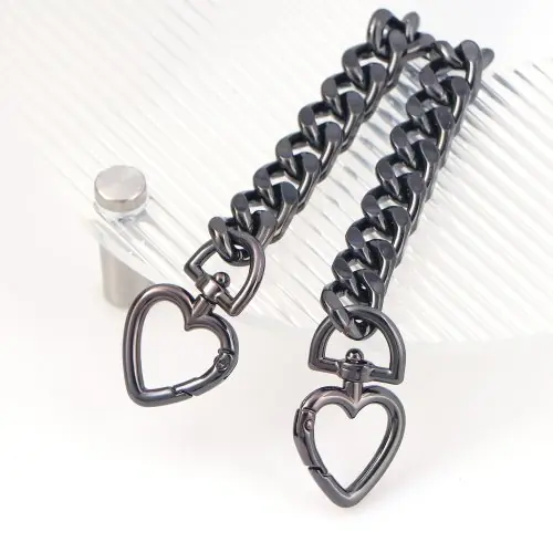 Image de Extension de sac à main en métal cœur - Accessoire élégant