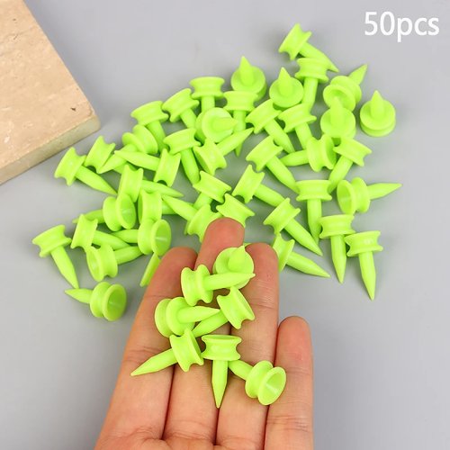 Afbeelding van 50 stuks golftees van 25 mm, professionele kwaliteit, groen, geschikt voor golfers, plastic golf t-shirts accessoire, perfect voor elke ronde