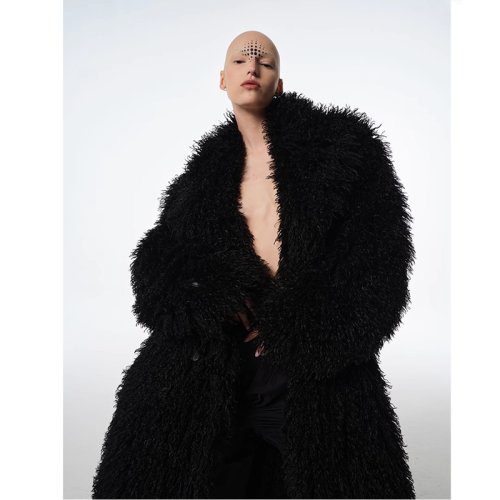 Bild von Eleganter Lammfellmantel – Warm & Stilvoll für Damen und Herren