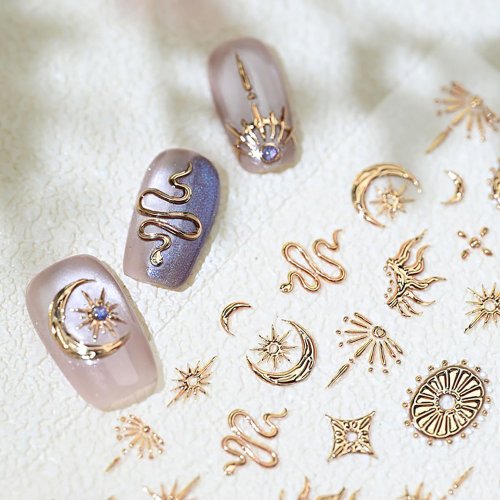 Afbeelding van Gouden & Zilveren Nagelstickers met Snake & Sterren Design
