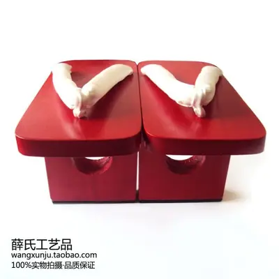 Image de Geta Japonais en Bois - Sandales Traditionnelles pour Hommes et Femmes